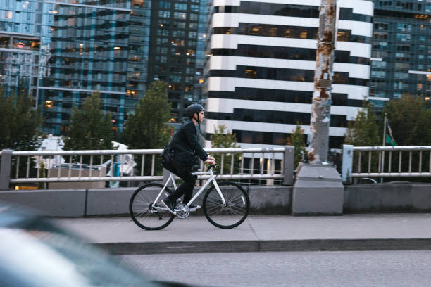 istock Bike Riding Urban Commuter at Dusk 1336744236