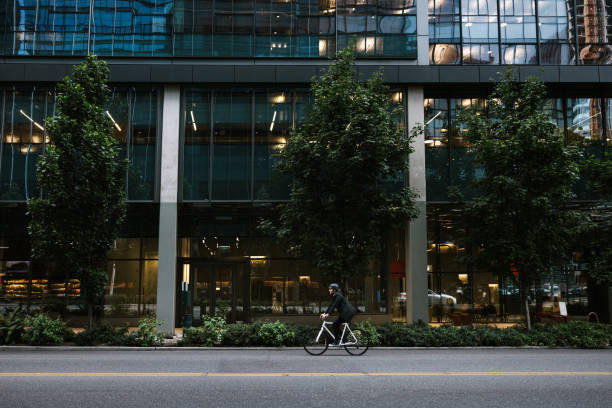 istock Bike Riding Urban Commuter at Dusk 1336744601