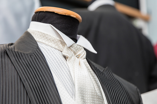 Detail of a mannequin with necktie at a tailor shop
