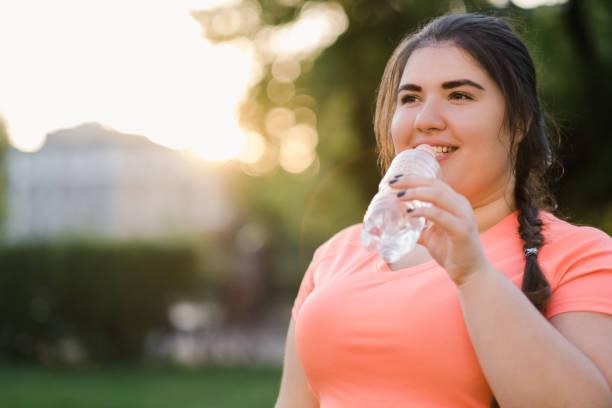 istock water detox body refreshment overweight woman 1336769743