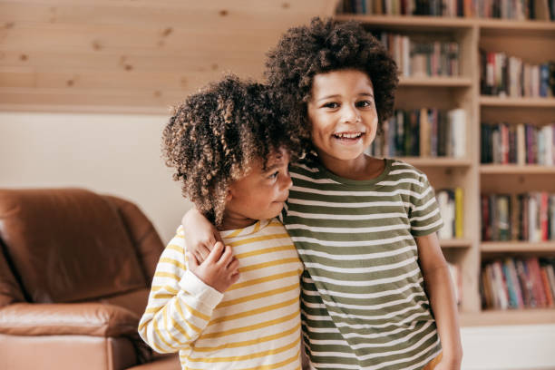 istock Cute siblings with similar hairstyle 1336769782