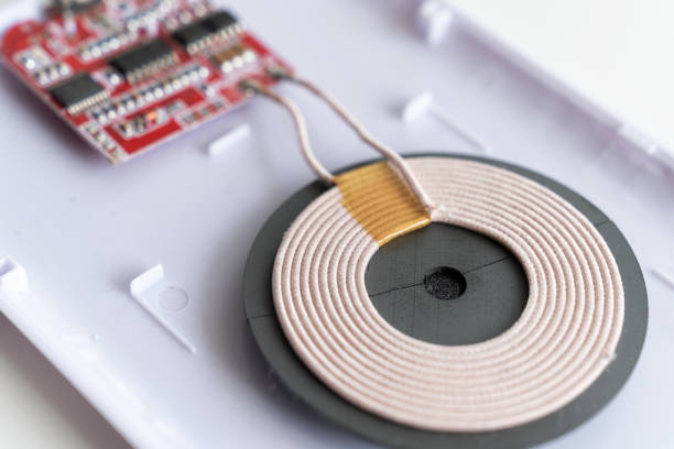istock disassembled, broken wireless charger for smartphone or phone. chip 1336791078