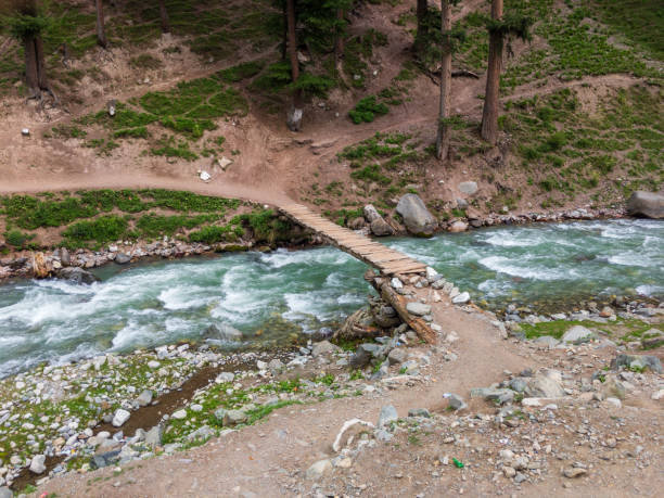 istock old wood bridge over a river in swat village 1336794350