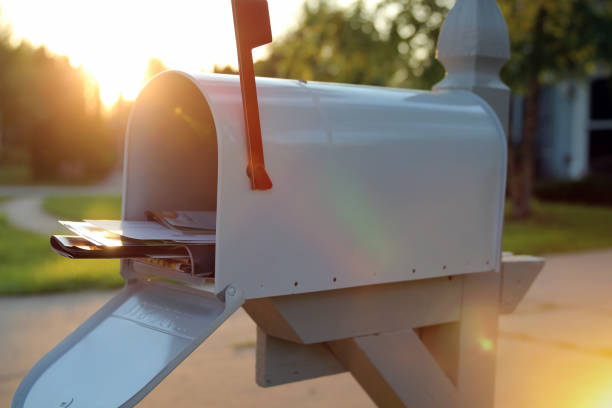 istock open mail box with a pile of letters and newspapers 1336798905