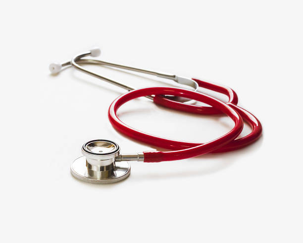 istock red stethoscope on gray background ,health care concept. 1336804875