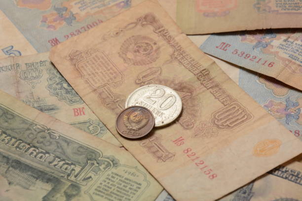 istock Old money USSR, Old Soviet coins and banknotes. Abstract money background 1336810901