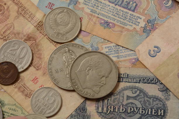 istock Old money USSR, Old Soviet coins and banknotes. Abstract money background 1336810904