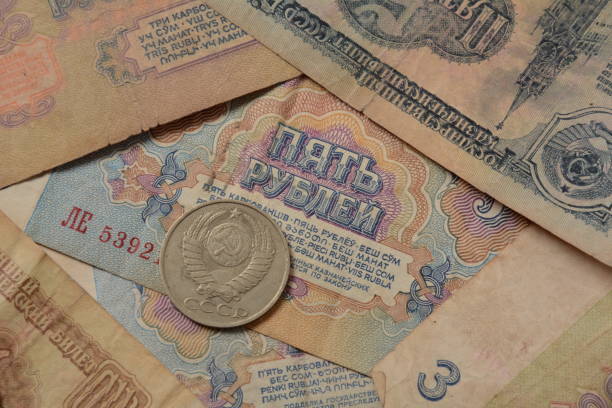 istock Old money USSR, Old Soviet coins and banknotes. Abstract money background 1336810905
