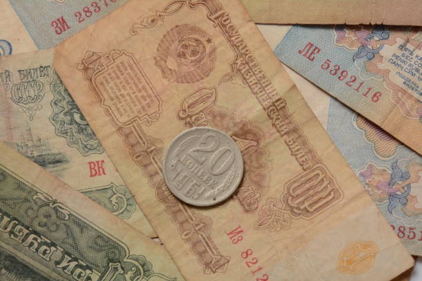 istock Old money USSR, Old Soviet coins and banknotes. Abstract money background 1336810906