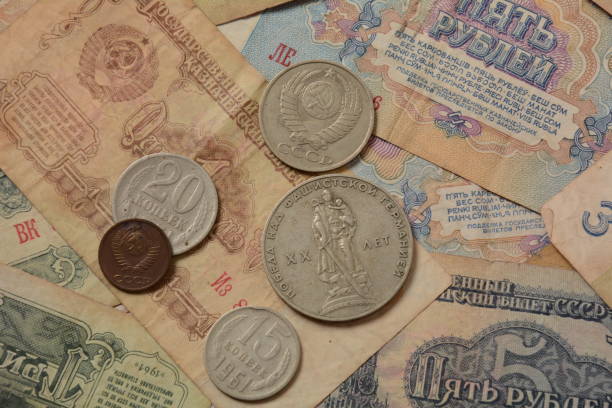 istock Old money USSR, Old Soviet coins and banknotes. Abstract money background 1336810909