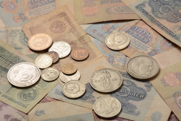 istock Old money USSR, Old Soviet coins and banknotes. Abstract money background 1336810914
