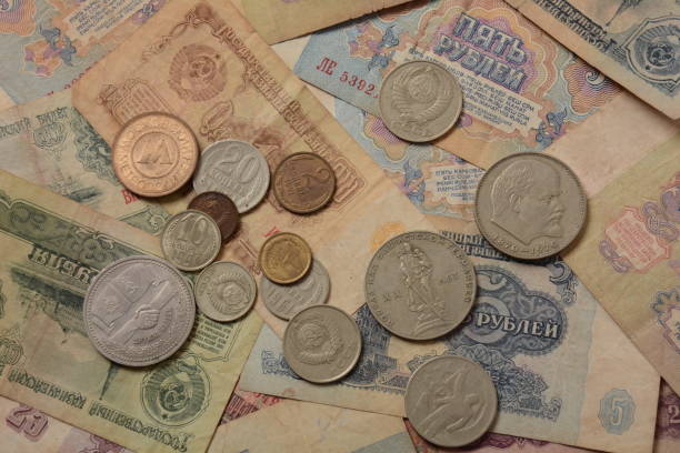 istock Old money USSR, Old Soviet coins and banknotes. Abstract money background 1336810918