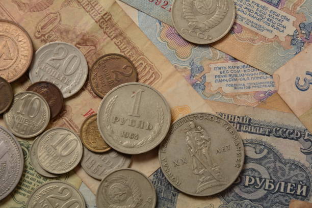 istock Old money USSR, Old Soviet coins and banknotes. Abstract money background 1336810920