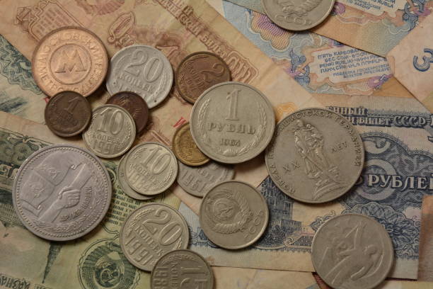 istock Old money USSR, Old Soviet coins and banknotes. Abstract money background 1336810922
