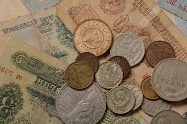istock Old money USSR, Old Soviet coins and banknotes. Abstract money background 1336810927