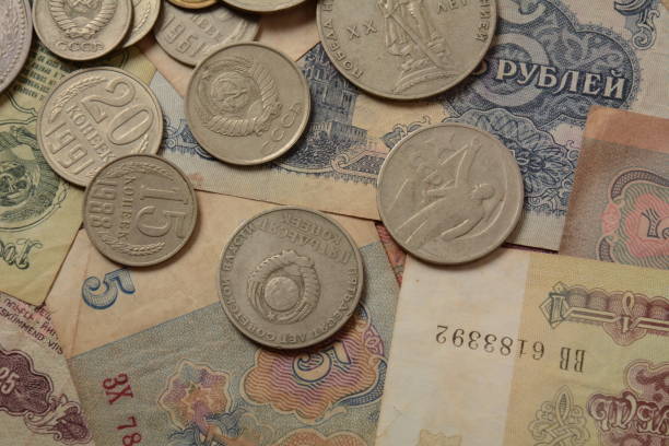 istock Old money USSR, Old Soviet coins and banknotes. Abstract money background 1336810932