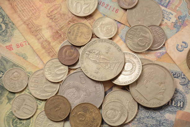 istock Old money USSR, Old Soviet coins and banknotes. Abstract money background 1336810944