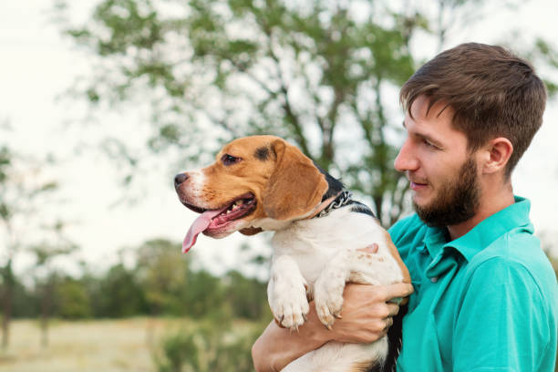 istock Portrait owner man with dog 1336815355