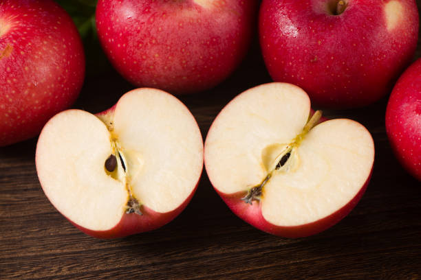 istock Fresh gala apples isolated on wooden background. 1336817340