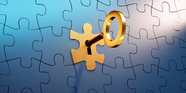istock Jigsaw Puzzle with golden Key 1336820311