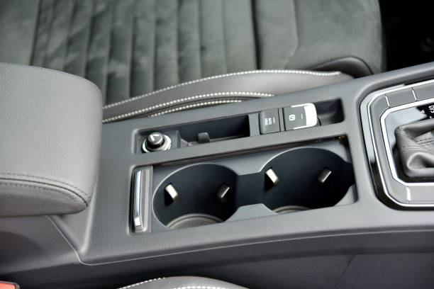 istock Cup holder between the front seats in the car 1336836001
