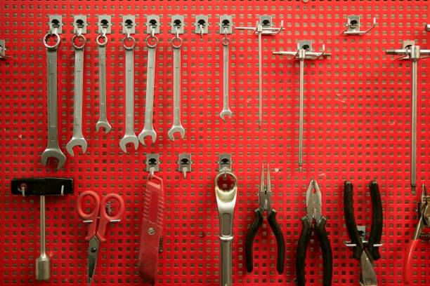 Hand tools red metal board to classified  tools Hand tools red metal board to classified  tools board key pegboard stock pictures, royalty-free photos & images