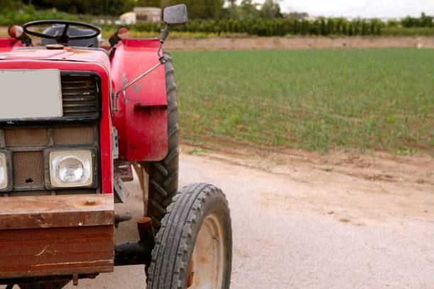 istock Agriculture aged red tractor retro vintage 1336837593