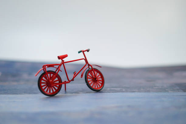 istock Miniature figures of red bicycle 1336842029