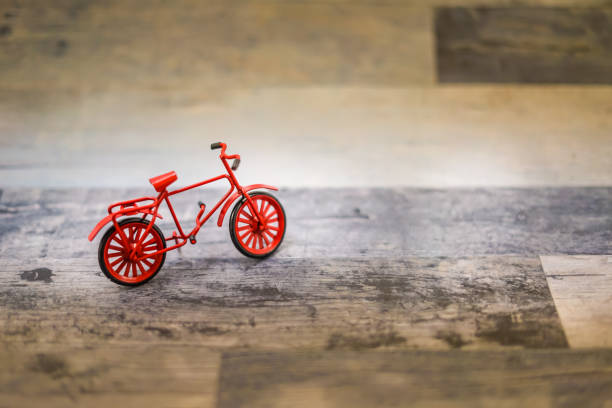 istock Miniature figures of red bicycle 1336842038