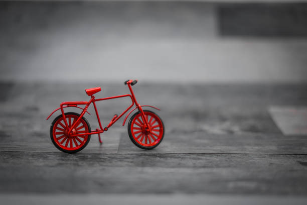 istock Miniature figures of red bicycle 1336842043