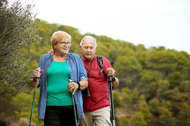 istock Senior couple hiking together during weekend 1336843061