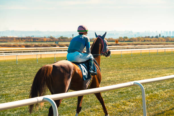 istock Jockey horse galloping 1336844158
