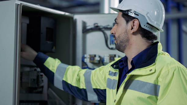 istock Engineer operates buttons and open the cabinet in factory 1336844533