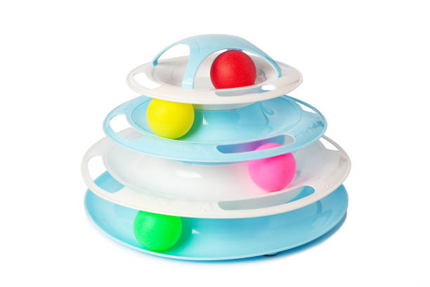 Interactive cat toy four level roller isolated on white background. Cat toy with colored plastic balls. Interactive Kitten Physical Exercise. hunting