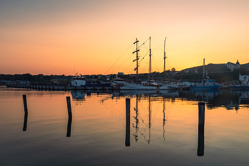 Ships in the evening in the port of Sassnitz on the island Ruegen, Germany.