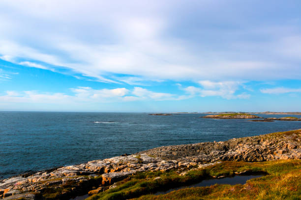 istock landscape with mountains and blue clouds in Norway, Atlantic oceon 1336850359