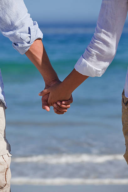 istock Enamored couple looking at the sea 133685395