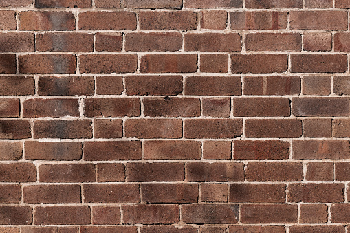 Repeating pattern of bricks in a wall