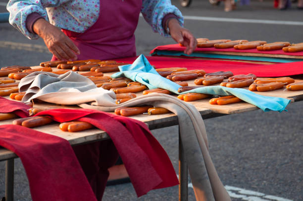 Workers were processing dried mullet roe.