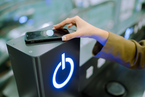 Innovation and smart hand using Wireless Smartphone Charger at airport.