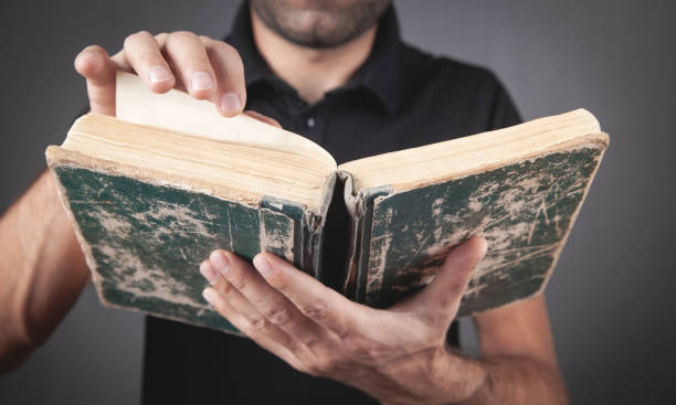 istock Caucasian man reading bible. Religion 1336868018