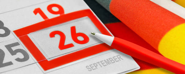 istock Calendar September 26  2021 and German Flag 1336868367