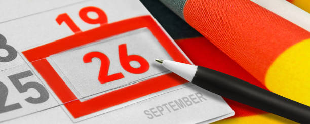 istock Calendar September 26  2021 and German Flag 1336868414