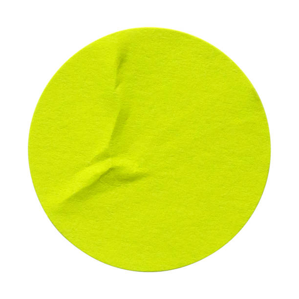 istock Green circle paper sticker label isolated on white background. 1336870662