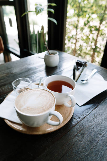 istock Cup of hot coffee on the table in a cafe 1336872510