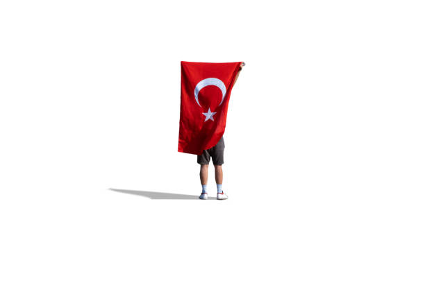 humano sosteniendo bandera turca - bandera turca fotografías e imágenes de stock