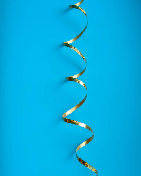 istock party ribbon confetti on blue 1336884629