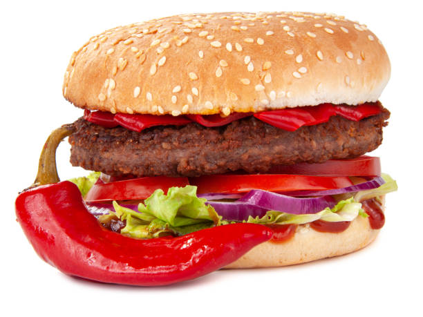 istock Tasty burger with pepper chilli isolated on the white 1336885674