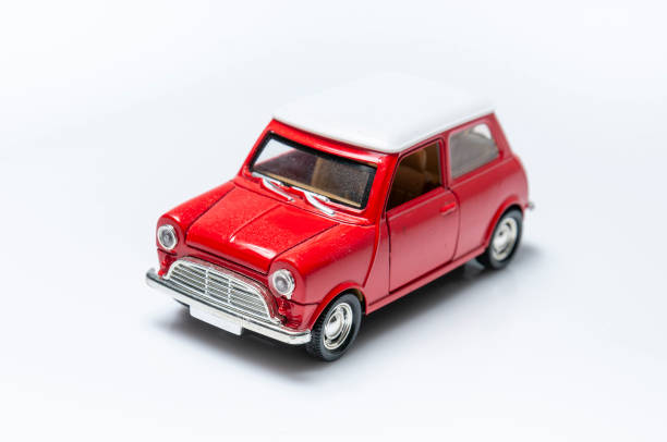 classic model toy car on white background - speelgoedauto stockfoto's en -beelden