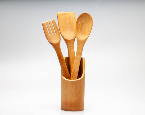 istock Wooden Fork and Spoon for Cooking on White Background 1336890954